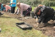 Hermitage Academy pupils excavating at Tarbet